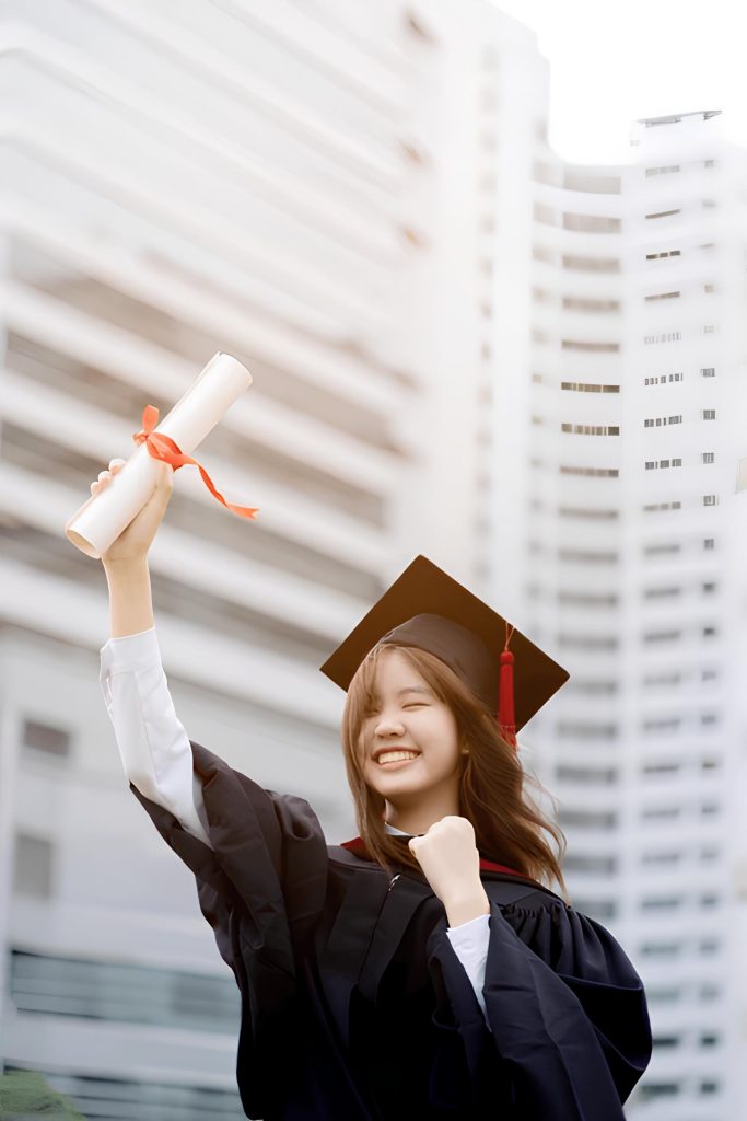Asian student holding scholarship certificate portrait